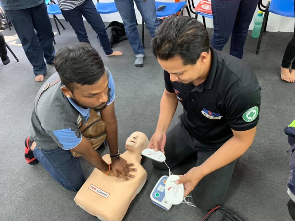 Participants mastering CPR Skills 