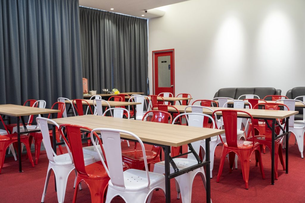 Empire Room set up with tables for a workshop